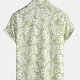 Blusa hawaiana de manga corta con estampado de flores
