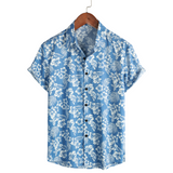 Blusa hawaiana de manga corta con estampado de flores