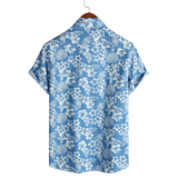 Blusa hawaiana de manga corta con estampado de flores