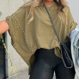 BELLA - CAMISETA OVERSIZE CON CLAVIJAS
