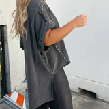 BELLA - CAMISETA OVERSIZE CON CLAVIJAS